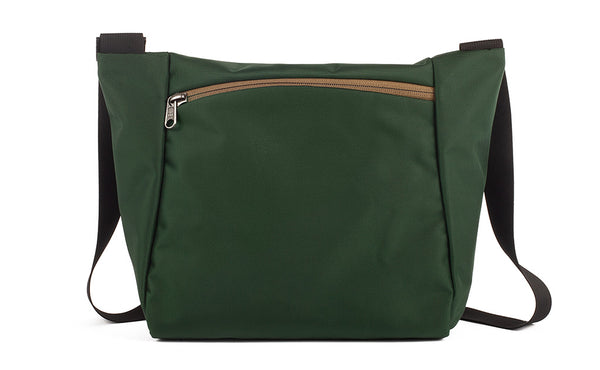 Reverse shot of an Icon in Wilderness (forest green) 525 Ballistic with Coyote (tan) zippers.